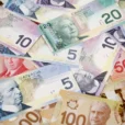 USD/CAD Surrenders Some Gains After US PPI, Canadian Employment Data